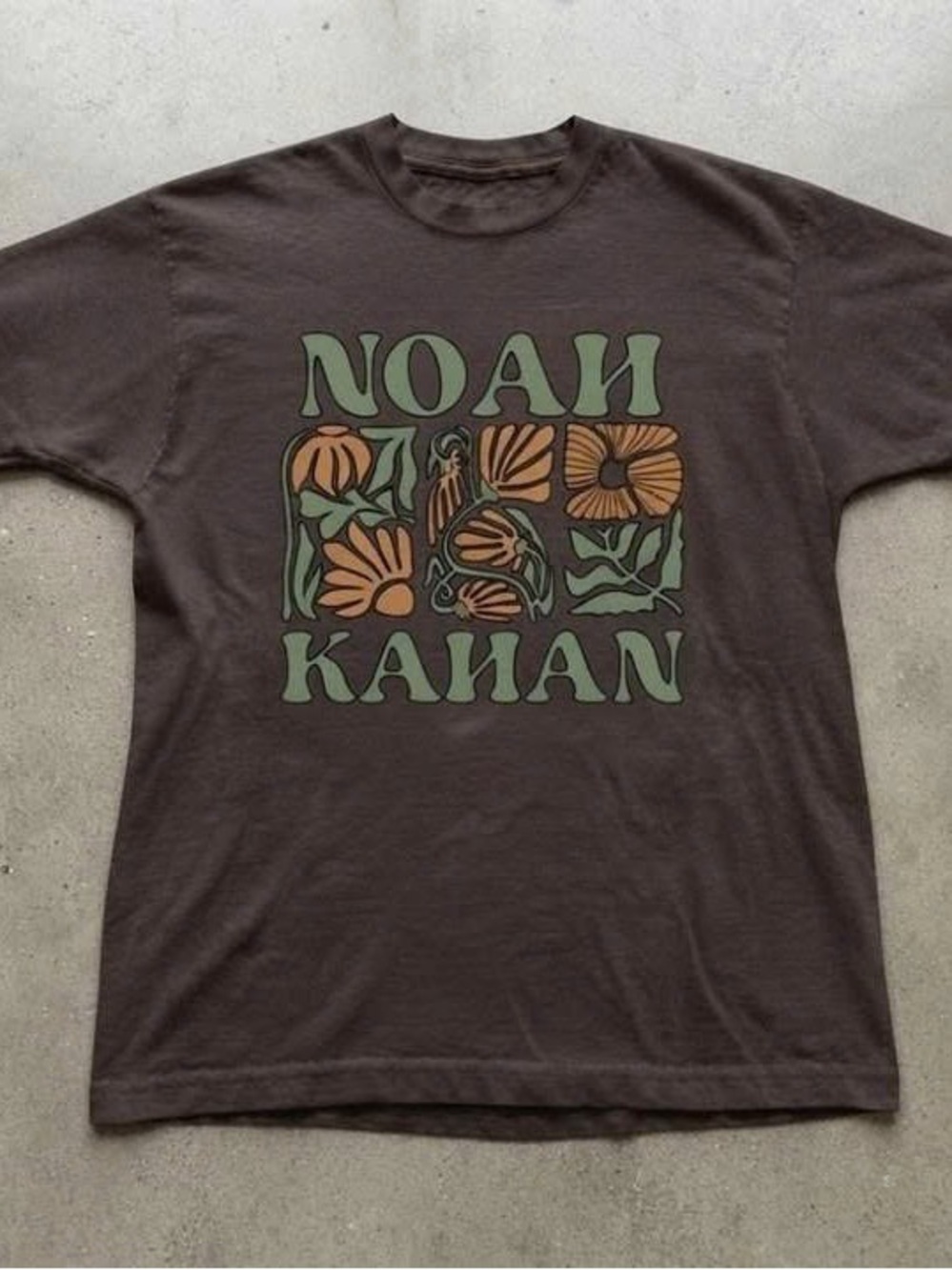 Noah Kahan Brown Tee with Green and Orange Floral Graphic